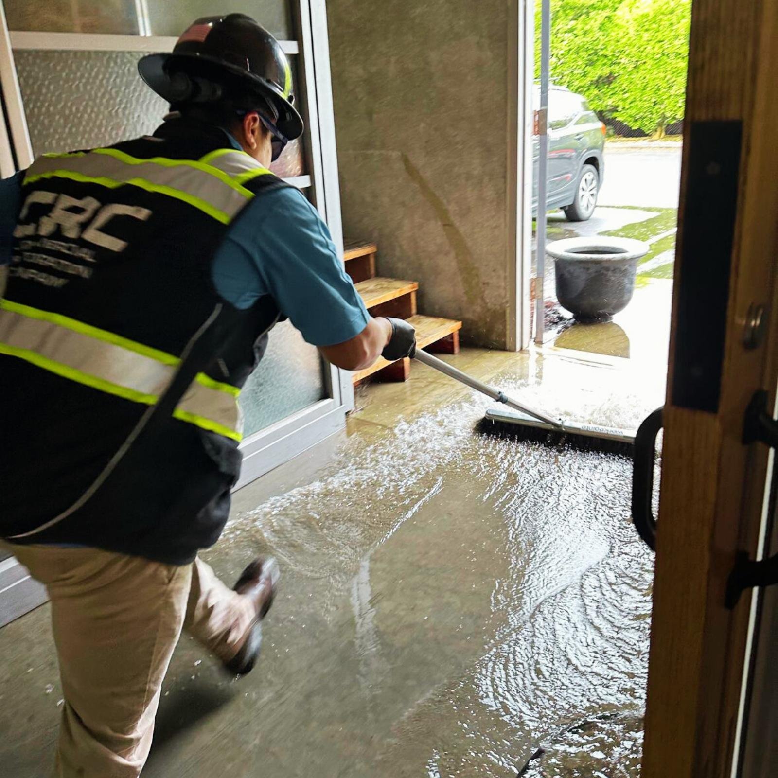 CRC Seattle removing water from flooded building