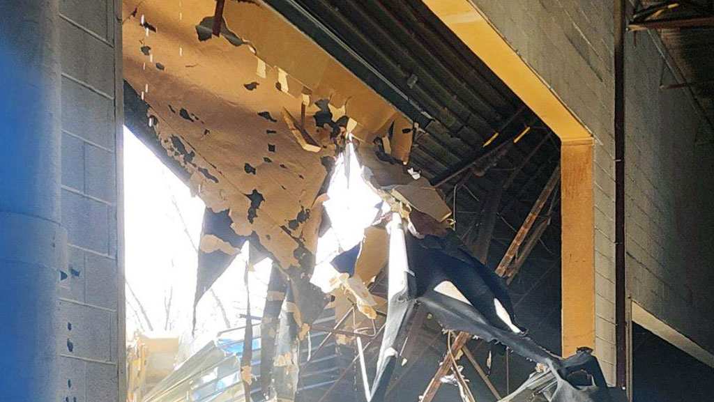 Warehouse facility damaged by a tornado.