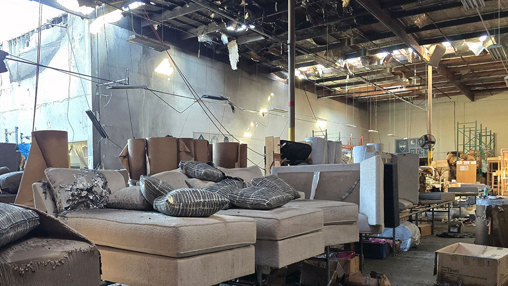 Fire damage in furniture manufacturing warehouse