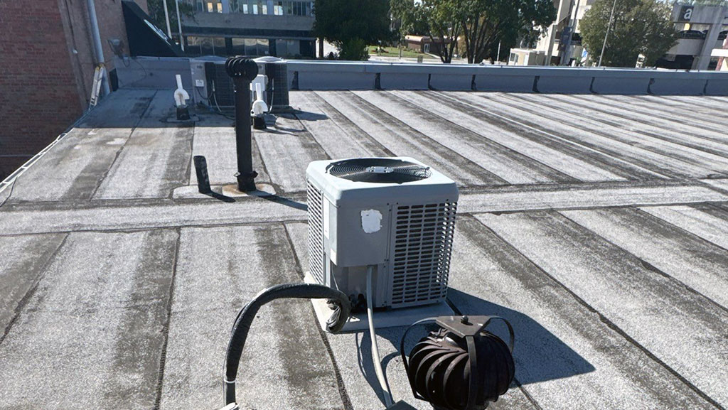 Image showing mechanical equipment on flat roof on a commercial building in Kansas City.